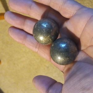 Couple of solid pyrite spheres